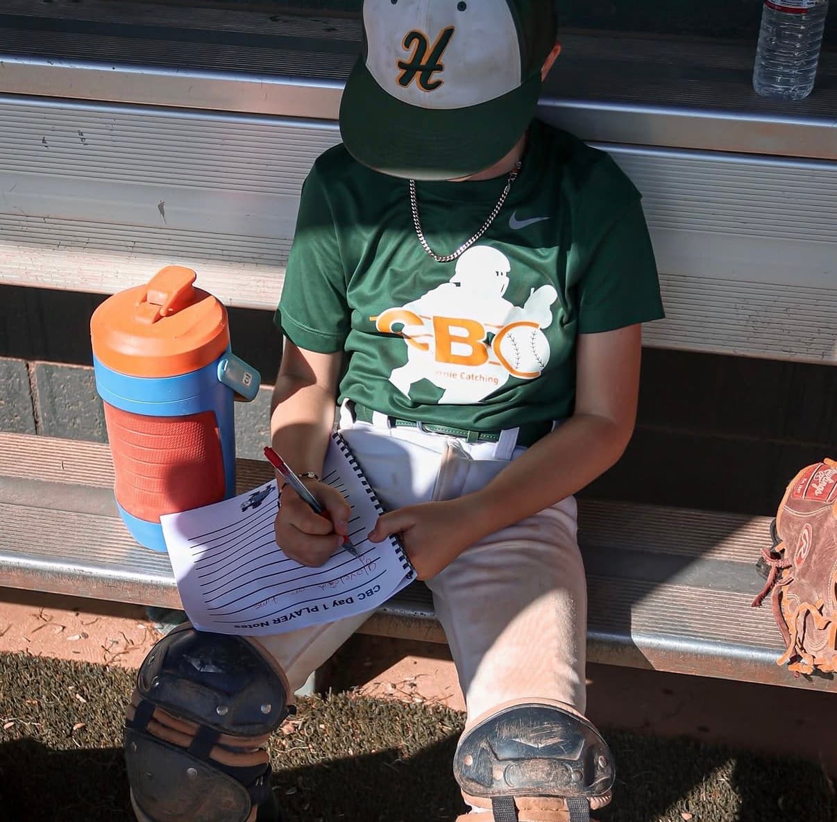 A catcher taking development notes